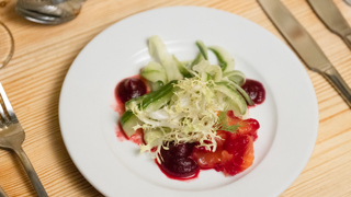 Plate shot of beetroot smoked salmon